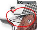 This is the back side of a 1911A1 with an ambidextrous safety. This is the back side of a 1911A1 with an ambidextrous safety.
