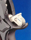 This is another view of a beavertail grip safety. Note that the hammer actually nestles into the top of the safety. This is another view of a beavertail grip safety. Note that the hammer actually nestles into the top of the safety.