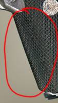 The rubber grips cover the front strap here. The rubber grips cover the front strap here.