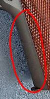 A standard front strap - no checkering. A standard front strap - no checkering.